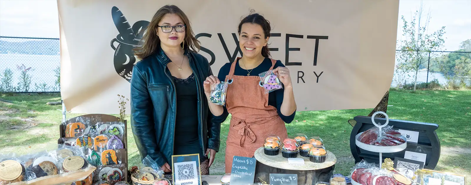 Bakery vendor showing off their goods at a festival